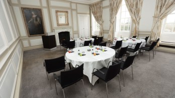 A large room set up for conference purposes in the hotel